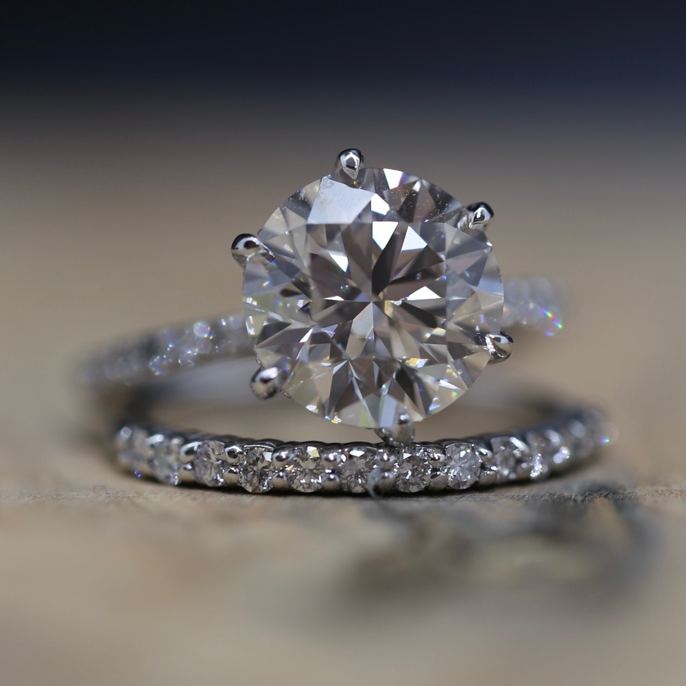 4 carat hidden halo diamond ring and wedding band